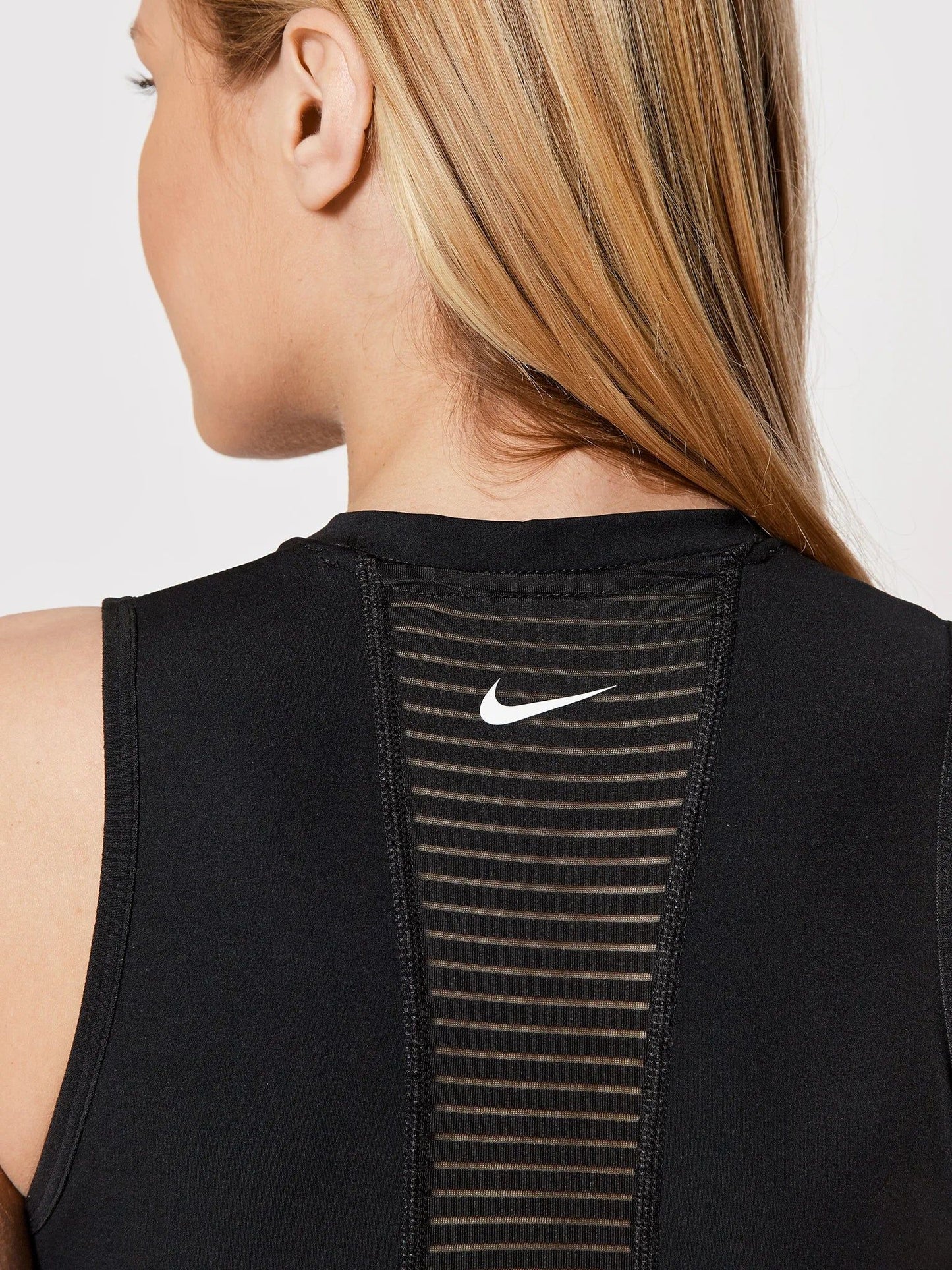 NIKE PERFORMANCE FEKETE NŐI FELSŐ - Golyó Sport